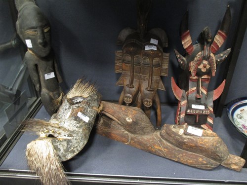 Lot 159 - A Japandai tribal carving 57cm long together...