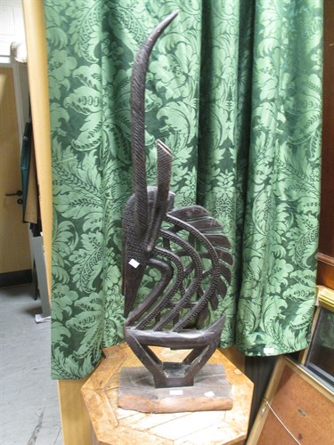 Lot 203 - An African carved wood figure of a Bamana...