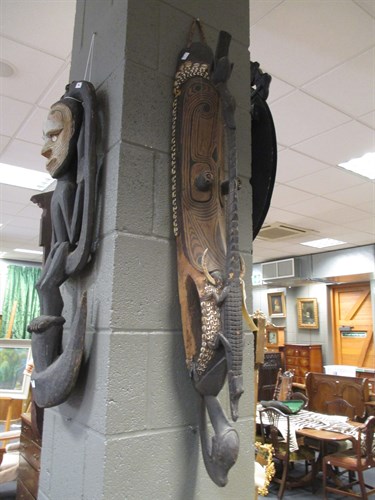 Lot 246 - A Papua New Guinea carved tribal hanging of an...