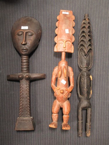 Lot 167 - A Fante tribal carved wood doll and an Akuaba...