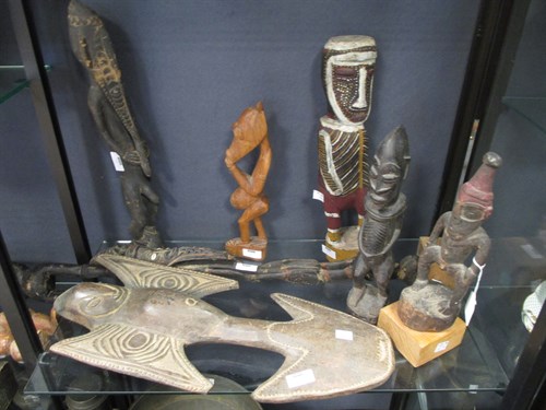 Lot 161 - Seven various carved wood tribal figures