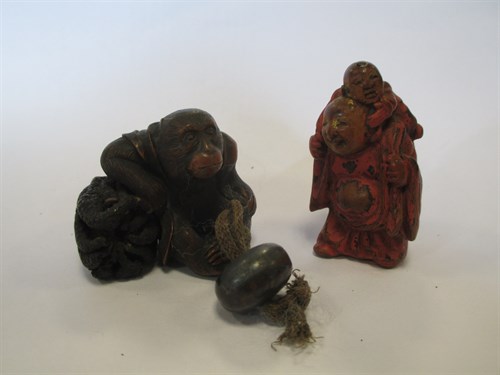 Lot 238 - Two wooden netsuke , Meiji period