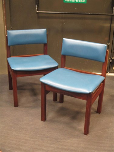 Lot 399 - Four modern chairs with blue leatherette...