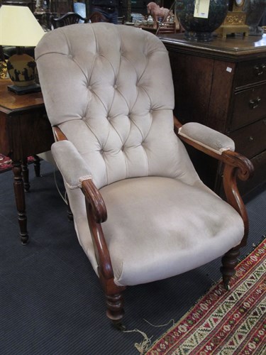 Lot 398 - A Victorian walnut button back armchair