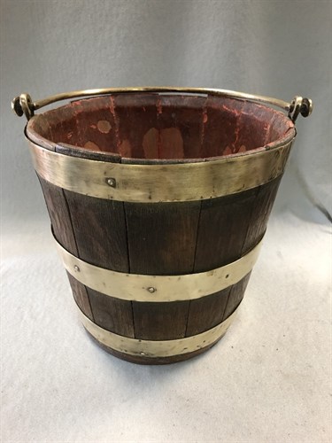 Lot 401 - A 19th century oak and brass bound peat bucket