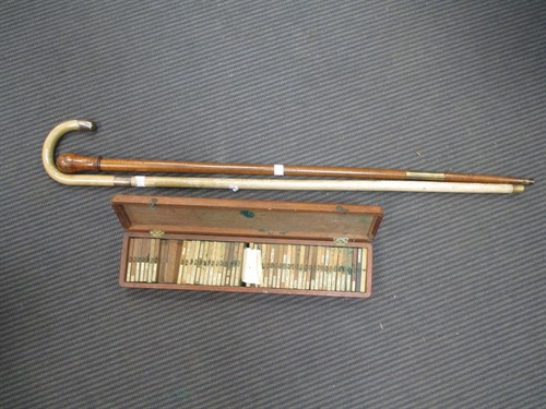 Lot 148 - Two walking sticks and box of early 20th...