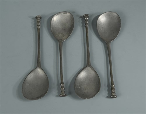 Lot 386 - A set of four pewter spoons