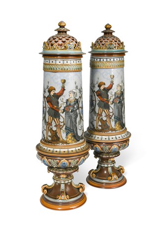 Lot 17 - A pair of Mettlach stoneware vases and covers