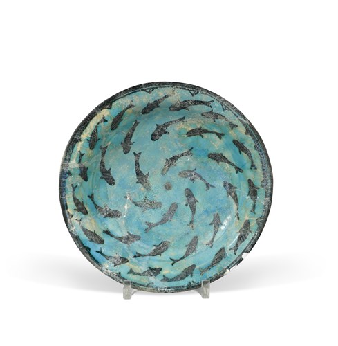 Lot 59 - An Iranian pottery dish, probably 13th/14th century