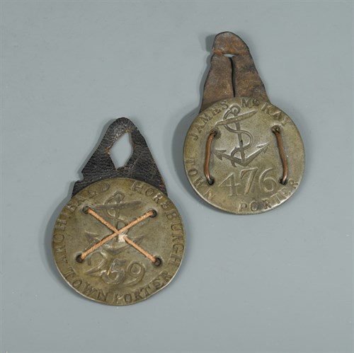 Lot 391 - Two 18th century Scottish pewter porter's badges