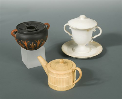 Lot 31 - An 18th century miniature Wedgwood caneware teapot and cover