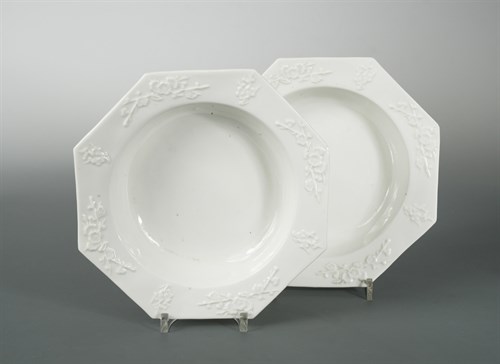 Lot 10 - A pair of English porcelain blanc de chine octagonal bowls, probably Bow, circa 1750-52