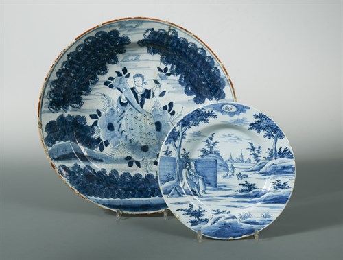 Lot 42 - An 18th century Delft blue and white charger