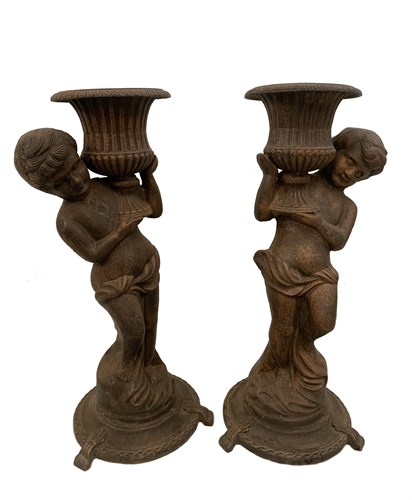 Lot 22 - A pair of cast iron figural jardiniere