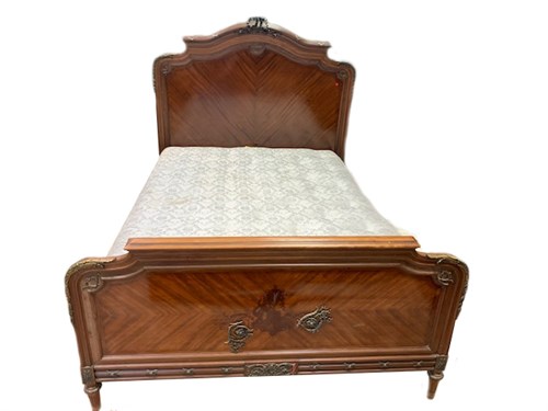 Lot 83 - A late 19th century French mahogany and gilt...