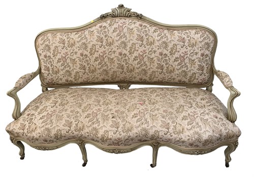 Lot 58 - A French painted salon suite carved with...