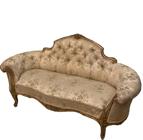Lot 63 - A late mid-Victorian gilt framed sofa with...