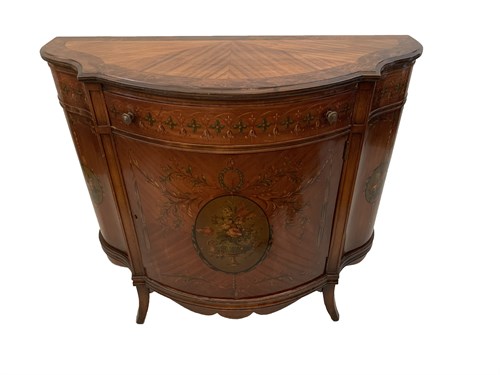 Lot 71 - A Sheraton Revival painted satinwood commode...