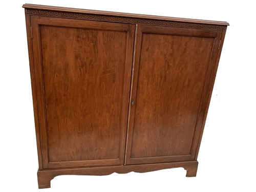 Lot 18 - An Edwardian mahogany two door cupboard with...