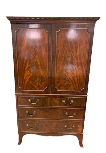 Lot 50 - A small mahogany press with dentil moulded...