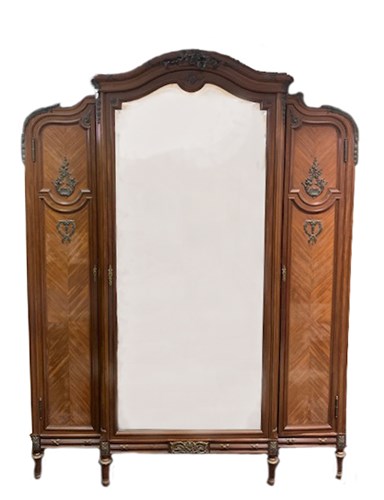 Lot 84 - A late 19th century French mahogany breakfront...