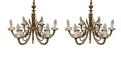 Lot 21 - A pair of cast brass six branch chandeliers,...