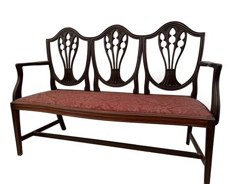 Lot 17 - An Edwardian mahogany chair back settee in the...