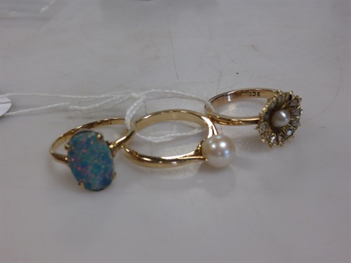 Lot 295 - A trio of dress rings, each marked '9ct' ,...