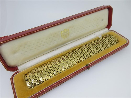 Lot 220 - A 1950s 18ct gold cuff bracelet cased by Cartier