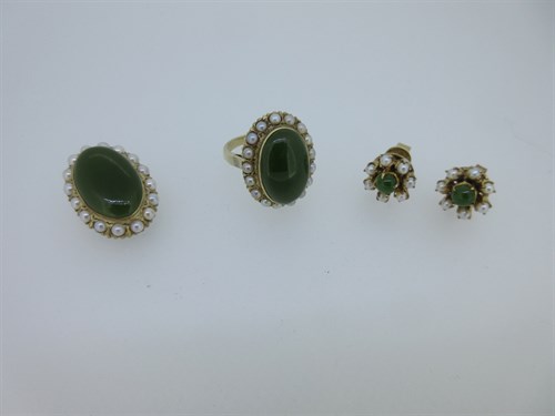 Lot 215 - A nephrite jade and seed pearl suite of ring,...