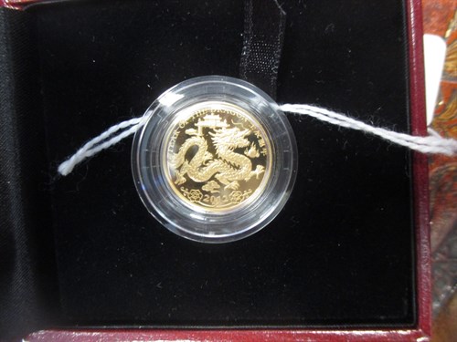 Lot 285A - A 2012 gold proof coin celebrating the Year of...