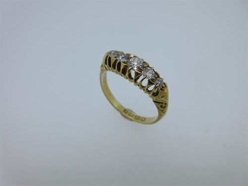 Lot 146 - An Edwardian 18ct gold and diamond ring