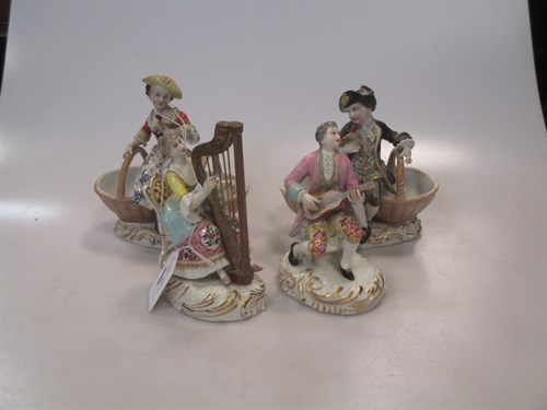 Lot 16 - A pair of Dresden figural bonbonieres with...