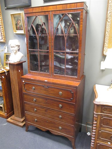 Lot 633 - A George III mahogany secretaire bookcase 207...