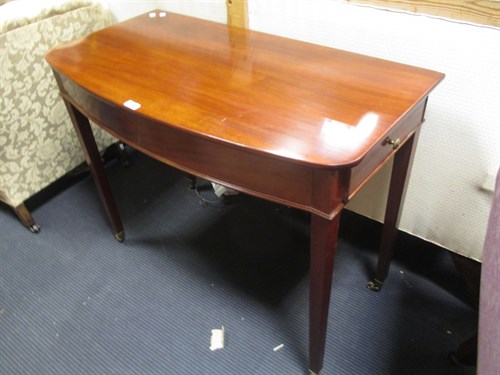 Lot 343 - A Regency mahogany bow front side table