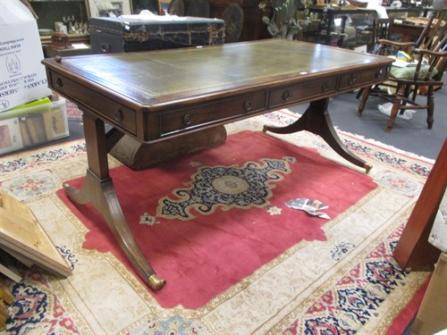 Lot 661 - A modern Regency style mahogany library table...