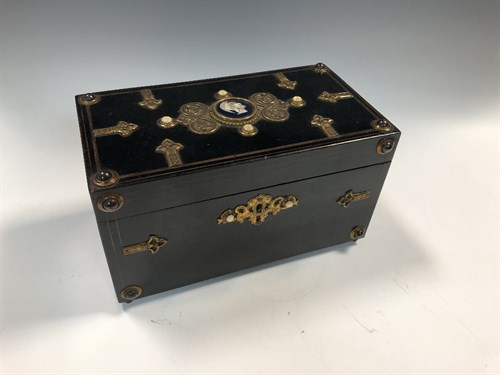 Lot 217 - A Victorian ebonised teacaddy, of rectangular...