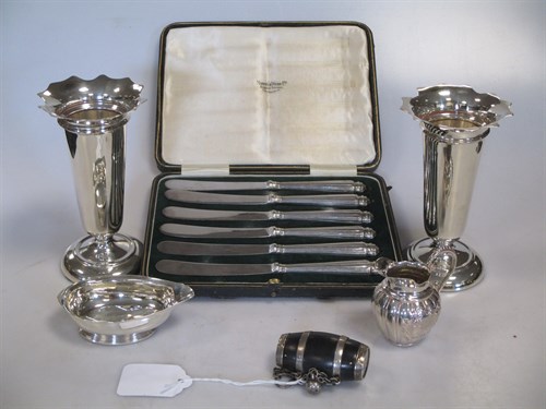 Lot 347 - A pair of silver trumpet vases, a silver jug...