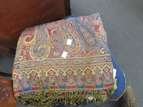 Lot 245 - A wool Jamawar shawl, in reds and blues