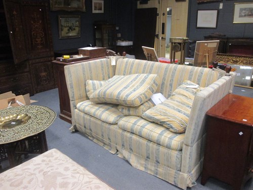 Lot 706 - A Knowle sofa upholstered in a yellow...