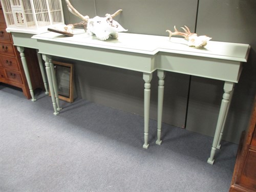 Lot 695 - A painted breakfront console 210 w cm