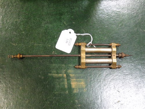 Lot 130 - A French onyx and brass mantle clock