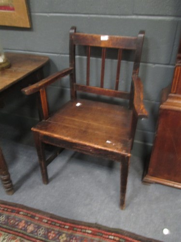 Lot 670 - A 19th century beechwood lath back armchair...