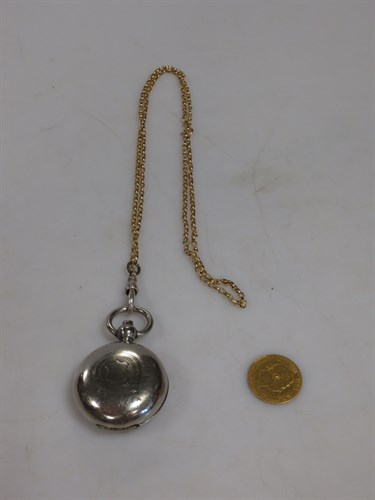 Lot 300 - A Victorian sovereign in a white metal...