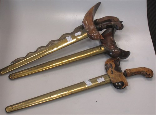 Lot 173 - Three early 20th century kriss, with plain...