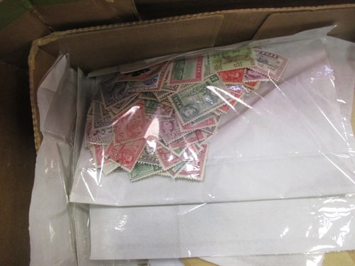 Lot 223 - Two boxes of world wide stamps in envelopes...