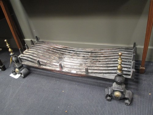 Lot 651 - A pair of fire dogs including grate and back