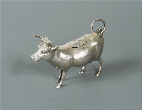 Lot 316 - A German metalwares silver miniature semi naturalistic cow creamer