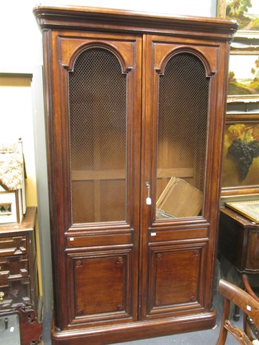 Lot 625 - A French mahogany armoire with wire doors 238...