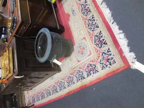 Lot 745 - Two pink ground wool carpets, Persian design,...
